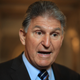 Image of the article titled Joe Manchin's Maserati surrounded by protesters who want a habitable planet after the death of Joe Manchin and his Maserati